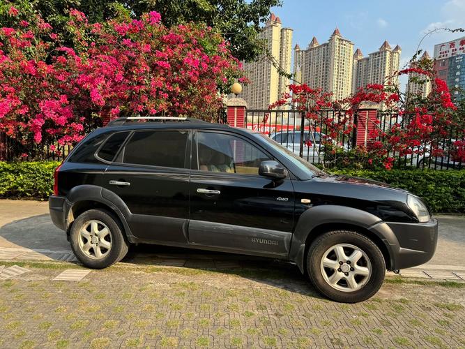 2008款现代途胜,2008现代途胜进油嘴在哪里打开图解视频